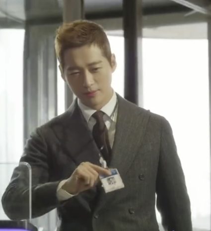 Nam goong min in a single-breasted conservative business suit