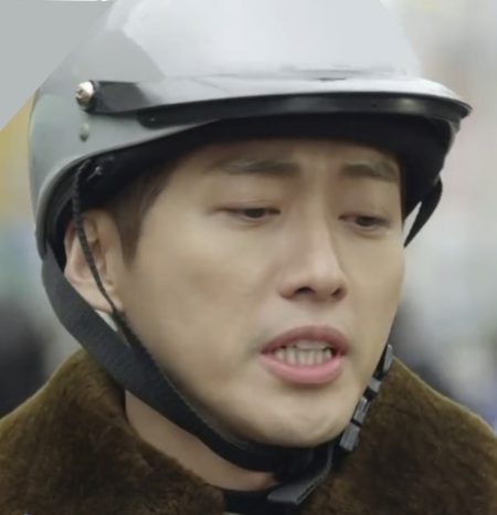 Nam Goong Min wears a silver helmet as part of his scooter look